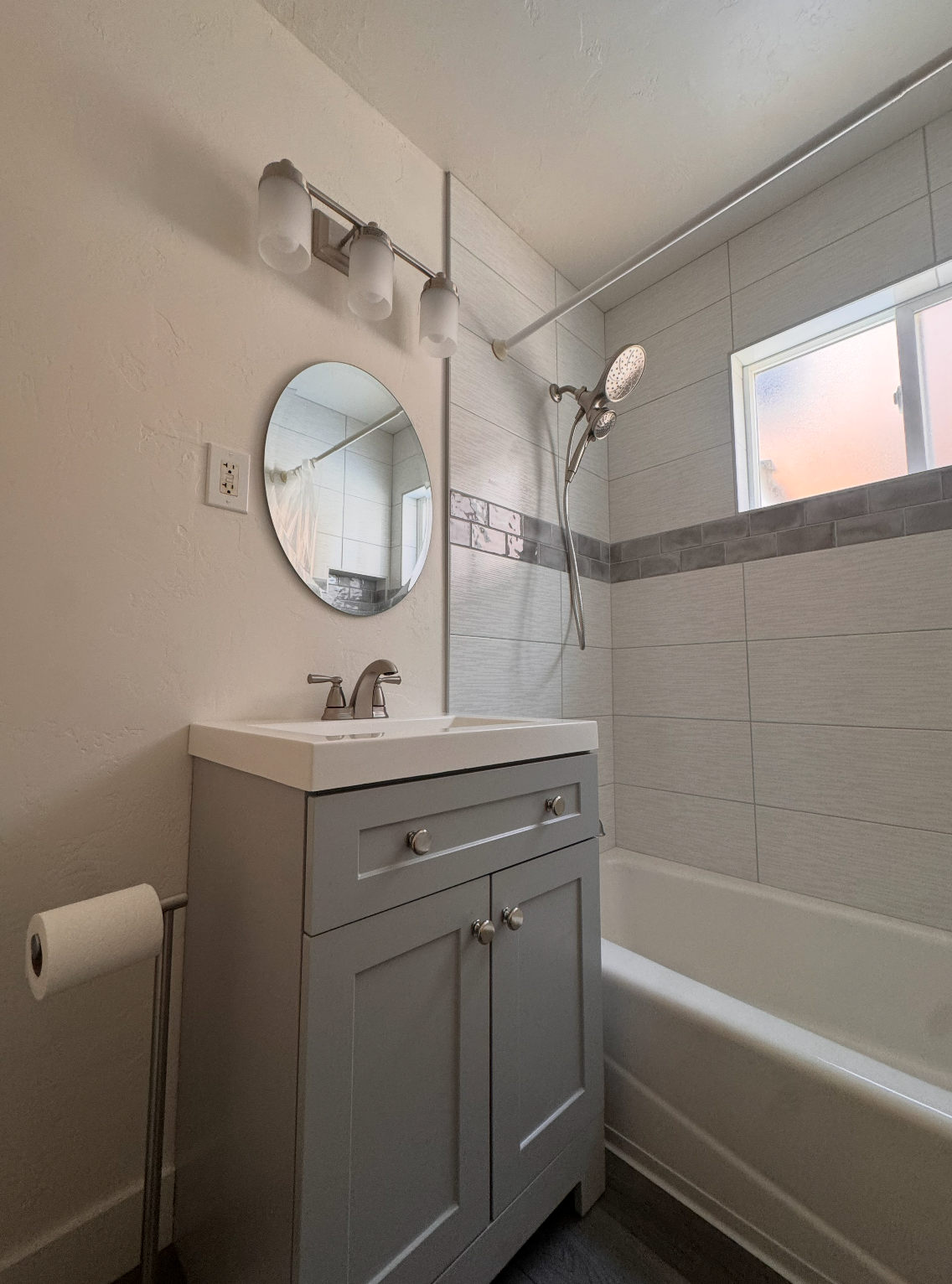 Modern restored bathroom after water damage repair